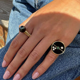 Compass Ring with Black Onyx and Emerald