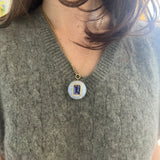 10.1ct Emerald Cut Tanzanite in Hand Carved Blue Lace Agate Lollipop Pendant